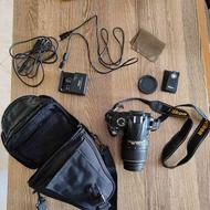 دوربین نیکون D3000 به همراه کیف و سه پایه