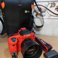 دوربین canon EOS 90d با لنز EF 50mm f1.8