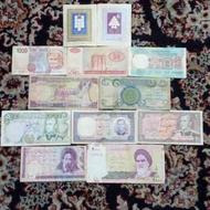 تعدادی اسکناس خارجی و ایرانی و تمبر نامه