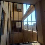 جوشکاری وتعمیرات ساخت محافظ لدر پنجره پایه کولر