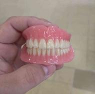 ساخت انواع دندان متحرک و روکش دندان