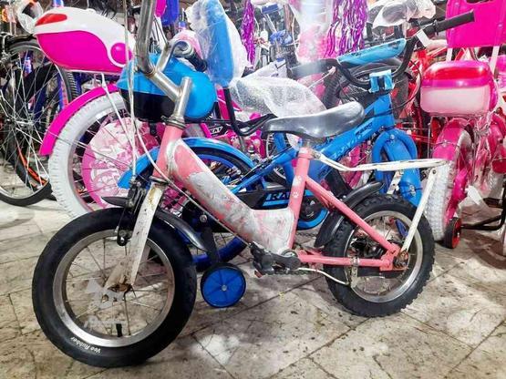 دوچرخه 12 صورتی در گروه خرید و فروش ورزش فرهنگ فراغت در زنجان در شیپور-عکس1