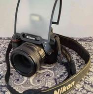 دوربین نیکون D3400 (( بدون لنز )) با لوازم