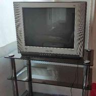 تلویزیون مدل supra ده تصویر و میز شیشه ای متحرک