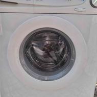 یک دستگاه ماشین لباسشویی اتومات کم کار درحد نو فروشی