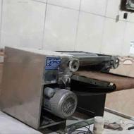 یک دستگاه پهن کن نان وکلوچه به فروش می‌رسد
