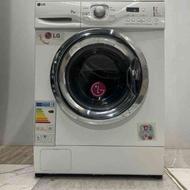 ماشین لباسشویی الجی سفید درب استیل