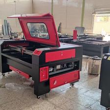 دستگاه برش و حکاکی با لیزر co2 با میز شمشیری
