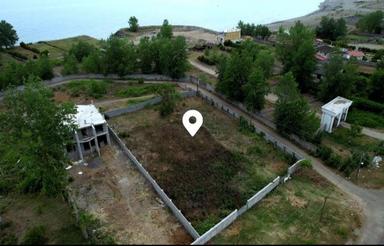 زمین 900متری بر جاده اصلی با شرایط اقساط