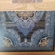 قالیچه تا نصف بافته شده