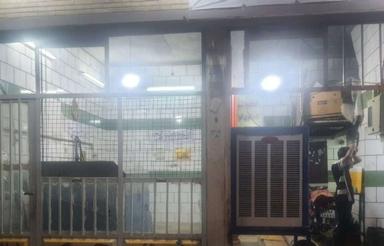 کارگاه بر خیابان اصلی علامه