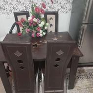 میزنهارخوری روکش چرم پایه اسیل 4نفره