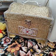 عروسک و صندوق ارایش