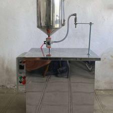 دستگاه پرکن بسته بندی عسل سه شیره خرما ارده عسلی کره