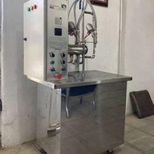 دستگاه پرکن مایع بسته بند شوینده جات ریکا جرمگیر شامپو