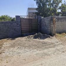 210 متر زمین داخل بافت مسکونی دور دیوار و درب ورودی