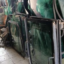 بیل و لودر شیشه انواع دستگاه های راهسازی بیل بکهو