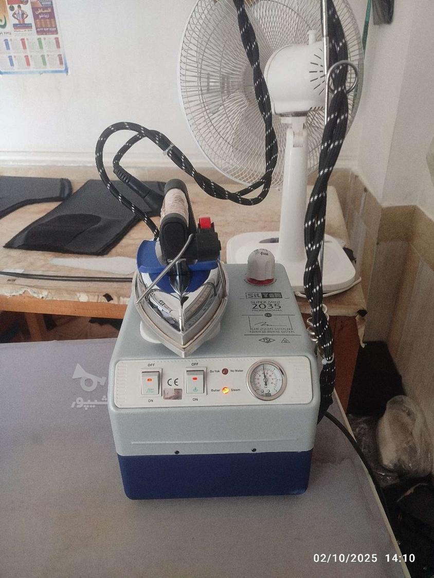تعمیرکار چرخ خیاطی نبی