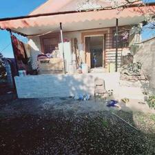 340 متر زمین با خانه ویلایی در نزدیک خشکبیجار