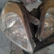 یک جفت چراغ جلو خودروی ریو و یک عدد سپر جلو