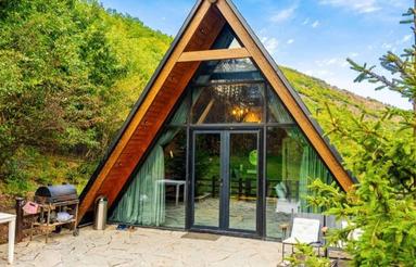 مشارکت در ساخت 10 دستگاه کلبه جنگلی