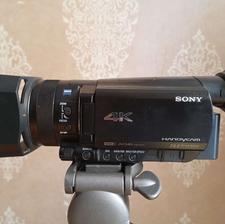 دوربین فیلمبرداری حرفه ای 4K با سه پایه