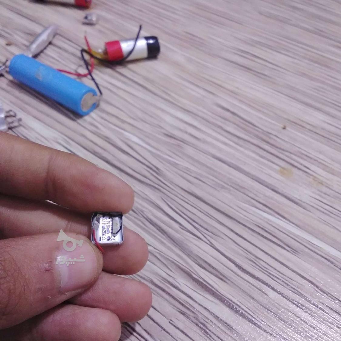 تعمیر تخصصی ایرپاد و هندزفری بلوتوث فروش باتری اصلی