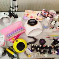 همه وسایلهای کاشت ناخن دست ،پا،شامل همه چی اصلا استفاده نشده