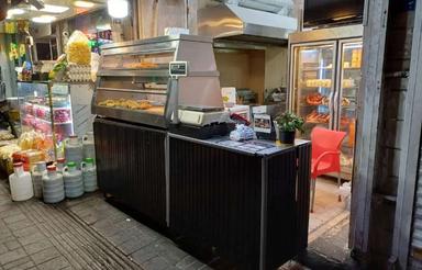 مغازه بر میدان شهدا