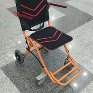 ویلچر سفری تاشو کتابی نارنجی رنگ استوک