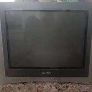 تلویزیون رنگی سونی همراه با میز زیر تلویزیونی