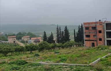 زمین مقابل دانشگاه آزاد جاده نظامی قائمشهر با سند مسکونی