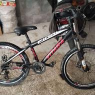 دوچرخه و لباس کشتی