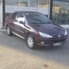 پژو 206 مدل sd v8 1394 بادمجونی