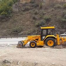 فروش بیل بکهو تی دی ال100اس مدل1403