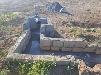 فروش باغ 1092 متری با 55درخت آجیلی ولوله کشی وبالف آب 8اینچ