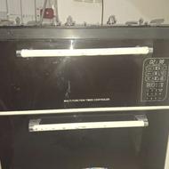 اجاق گاز صفحه شیشه ای ولم بالا طرح فر