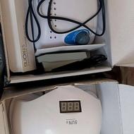 وسایل کاشت ناخن شامل سوهان برقی ،یوی،قیچی مانیکور و......