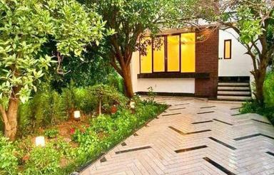 ویلاشمالی واقعی،وسط باغ مرکبات،با نگهبانی تمام وقت180متر