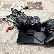 یک عدد پلی استیشن 2به همراه 3تا دستگیره