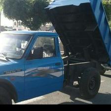 نیسان کمپرسی حمل ماسه و سیمان و..‌.