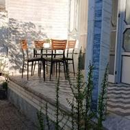 میز شیشه ای با پایه فلزی + 4 عدد صندلی