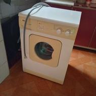 لباس شویی ابسال