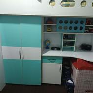 تختخواب و کمد لباس و میز کامپیوتر و اسباب بازی