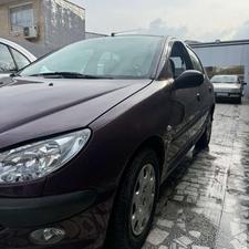 پژو 206 (تیپ2) 1396 بادمجونی