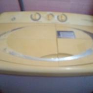 این ماشین مدل دوقلو و مجهز به خشک کن لباس هستش رنگ کرم