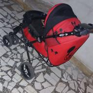 کالسکه قرمز کاملا سالم و راحت جمع شو و تمیز بدون پارگی