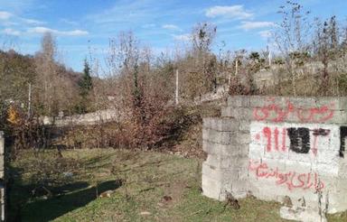 زمین چسبیده به جنگل نهر با پروانه ساخت جاده سه هزار