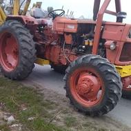 تراکتور بیل بکهو و تیغه جلو