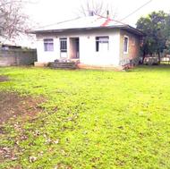 بنای 100 متری و زمین 716 متری مسکونی با سند تک برگ